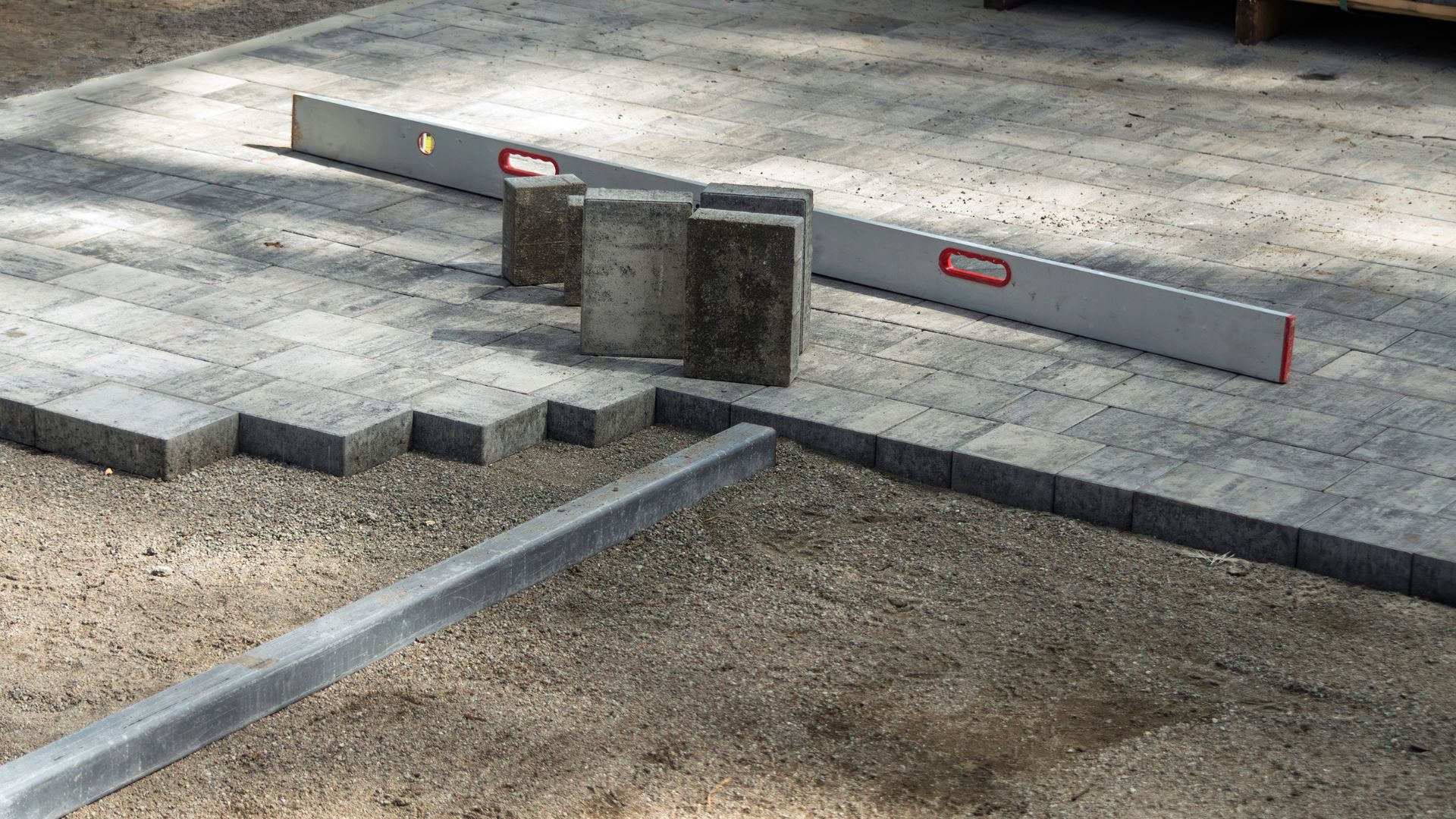 Paver installation showcasing patio and backyard designs